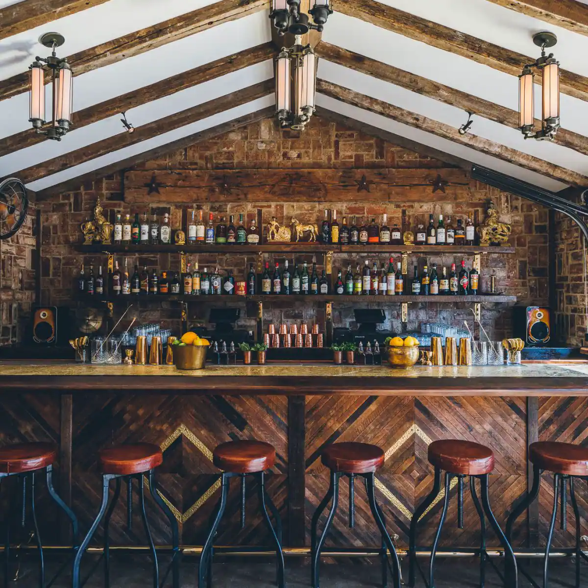 Front view of a stocked bar of Urban Cowboy's Public House.